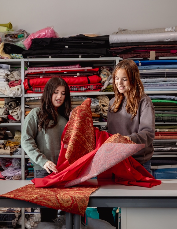 Students with fashion materials